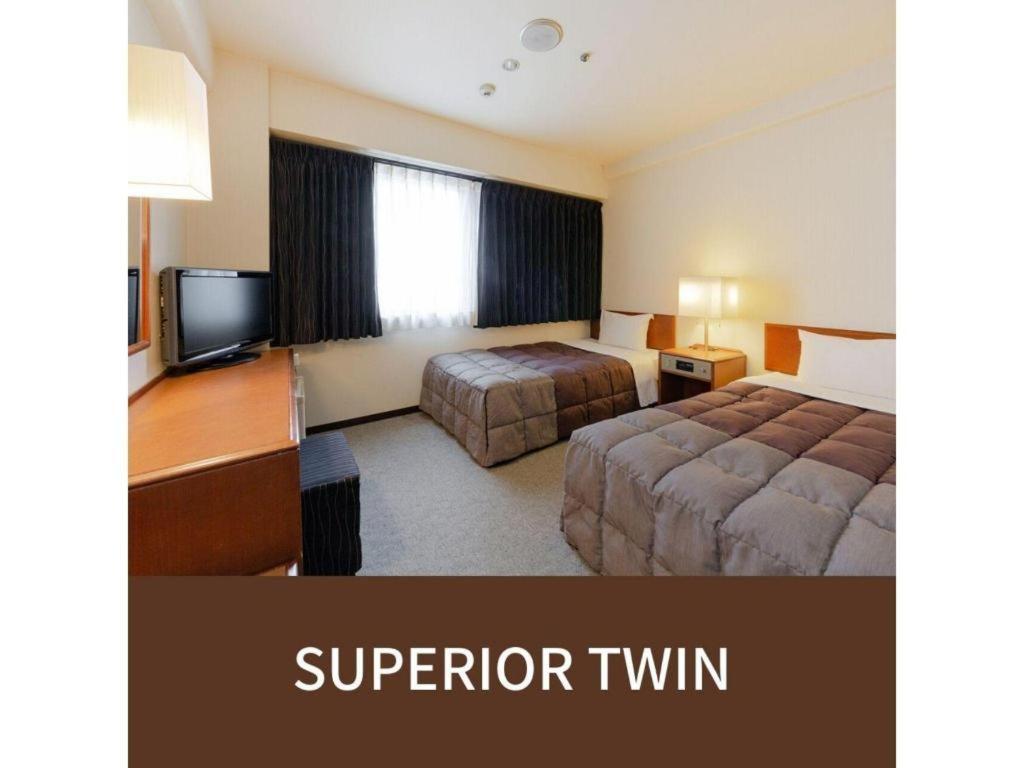 พลาซ่า โฮเต็ล เทนจิน Hotel ฟูกุโอกะ ภายนอก รูปภาพ